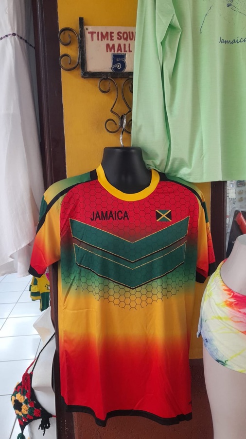 Jamaica football jersey on display under the Time Square Mall Shop 5 sign
